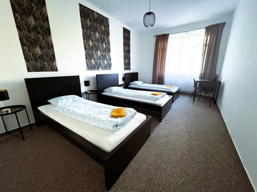 1 - Economy Triple Room with Shared Bathroom Photo 1